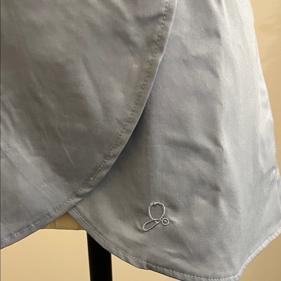 Jaanuu Blue Lavender Zippered Peplum Women's Scrub Top - Picture 4 of 5